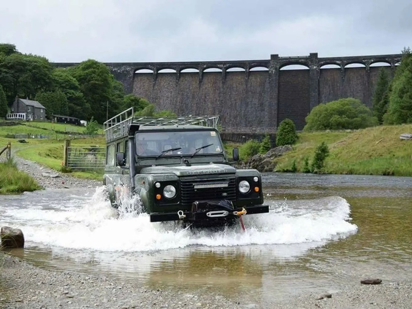 Land Rover Defender crossing the river